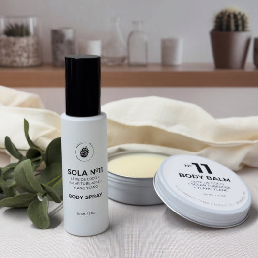 Body spray and balm with 'Sola No. 11' branding on a neutral background