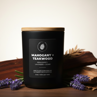 Black candle with wooden lid and label on a dark background with lavender and wood elements.