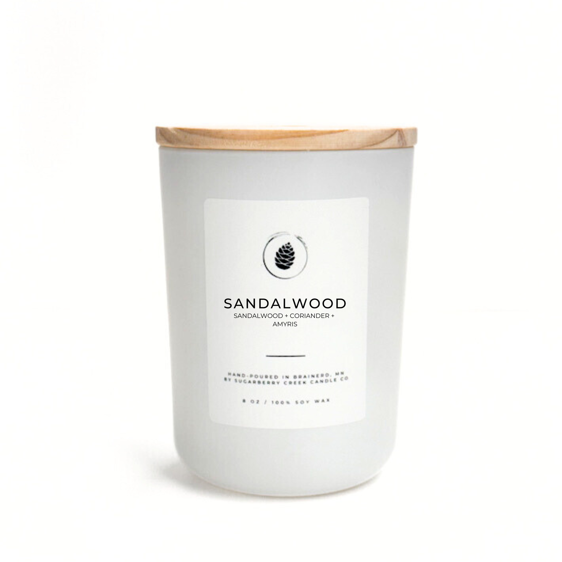 Sandalwood candle with a wooden lid on a white background